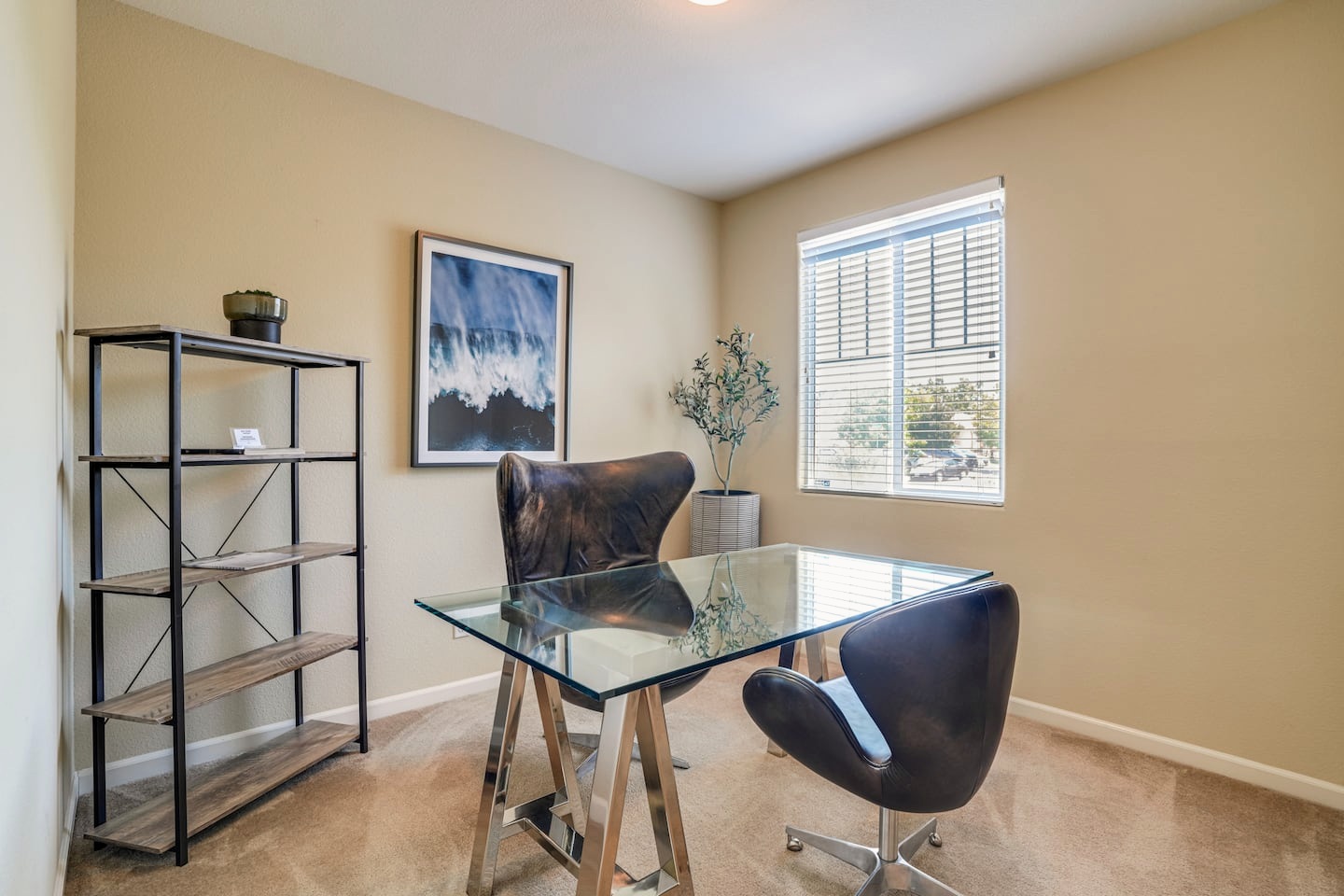 Dedicated home office with staged desk equipment